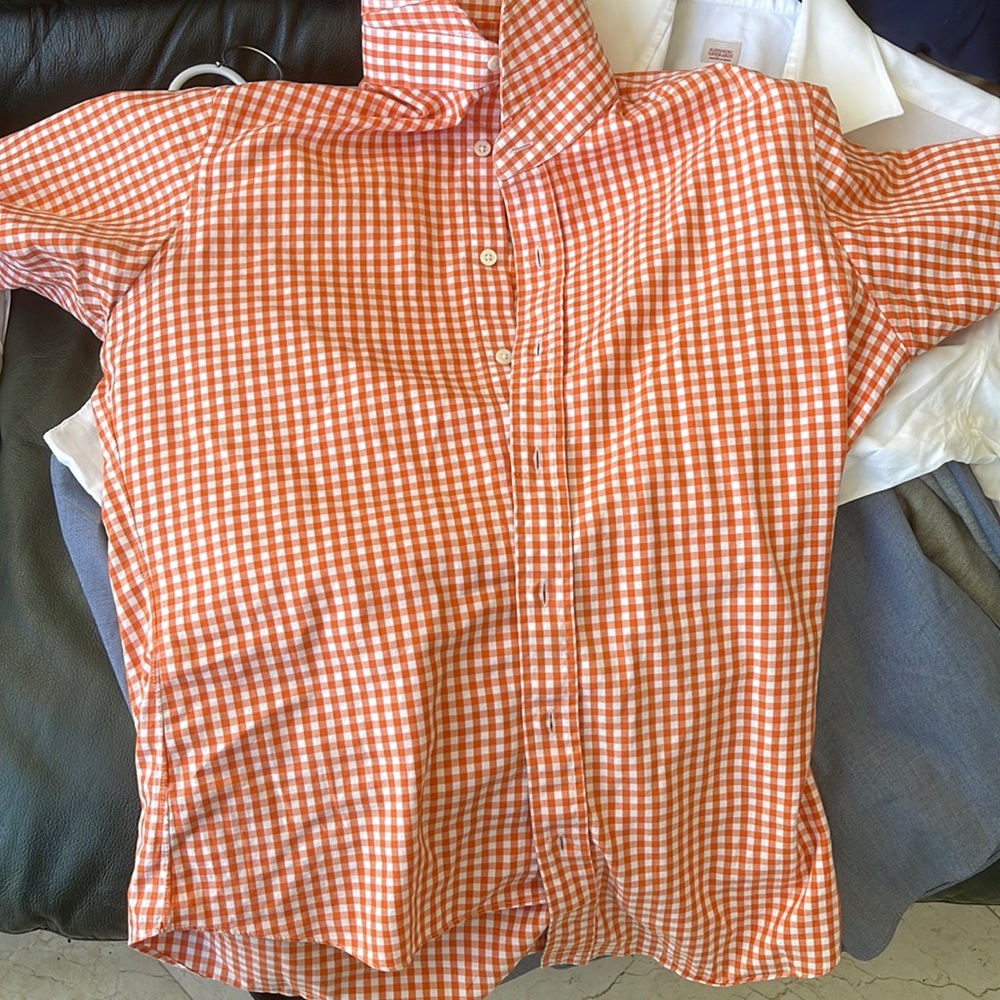 Top quality custom made button down shirt. “Swivel” embroidered in collar